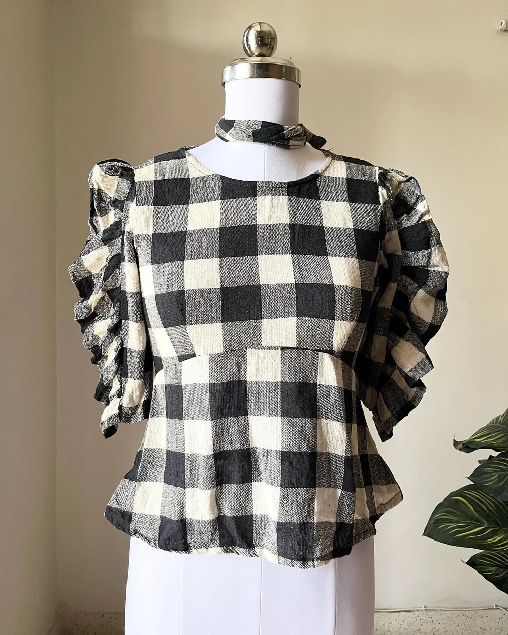 Checkered peplum top 