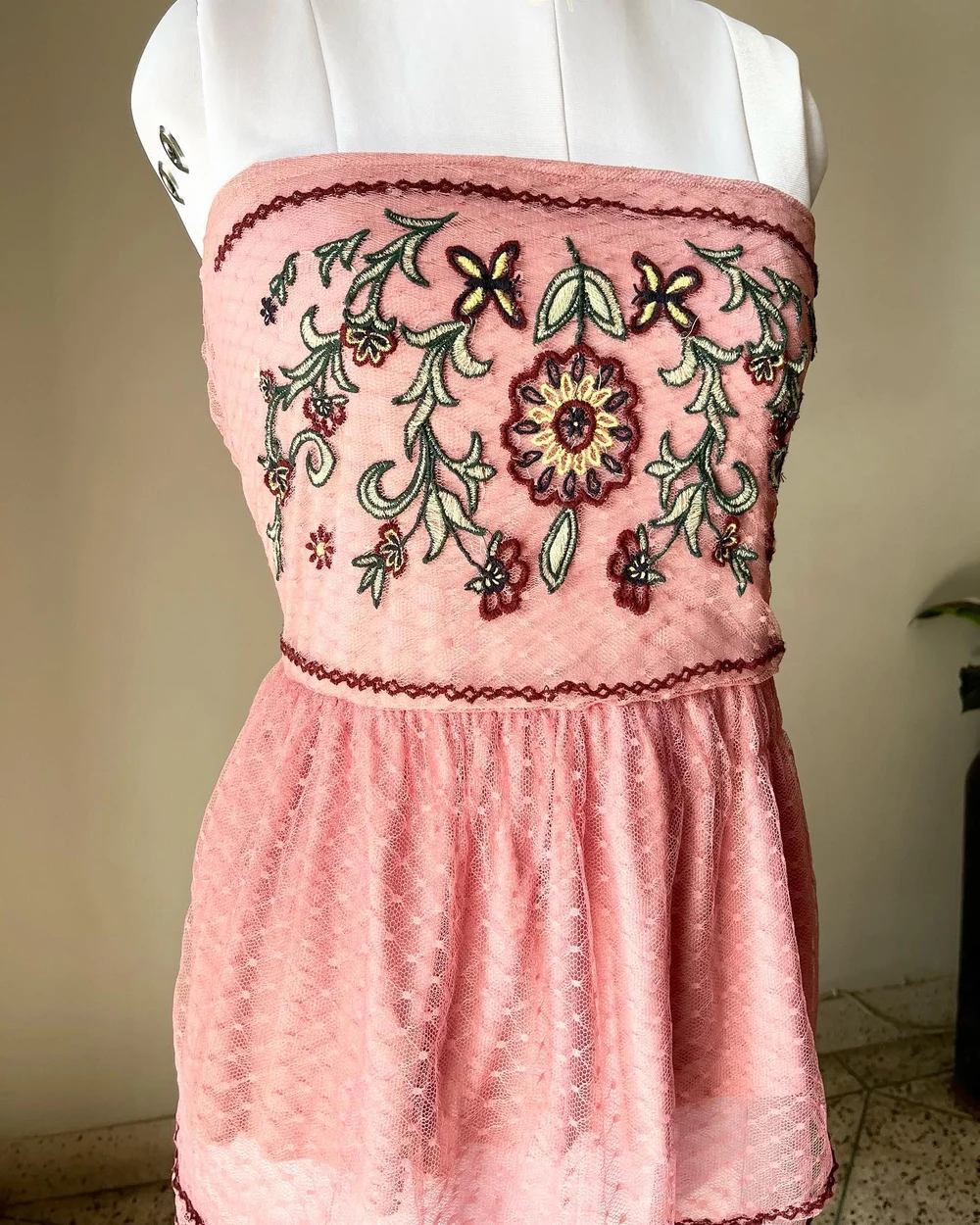 Embroidered pink tube peplum top 