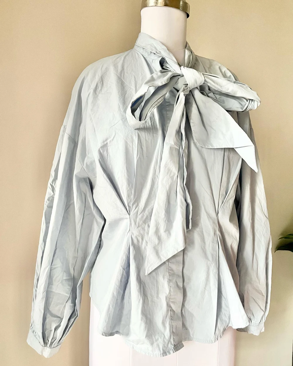 Pastel blue tie-up neck shirt 