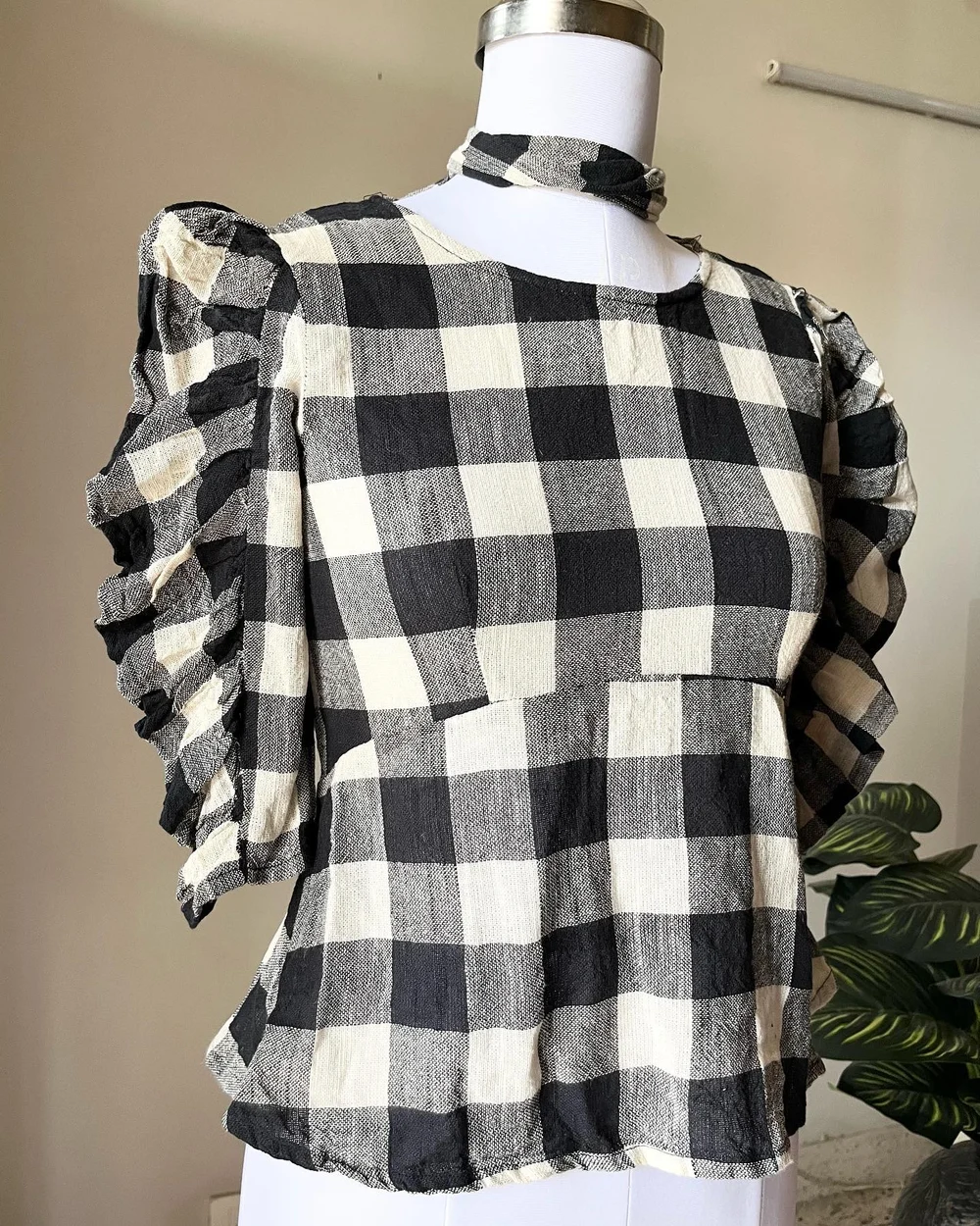 Checkered peplum top 