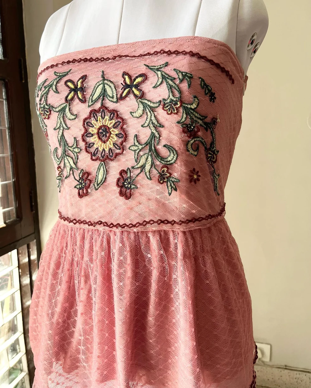 Embroidered pink tube peplum top 
