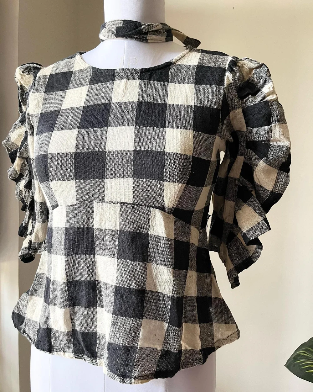 Checkered peplum top 