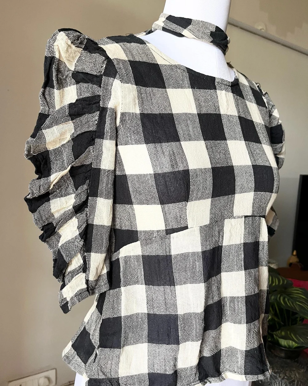Checkered peplum top 