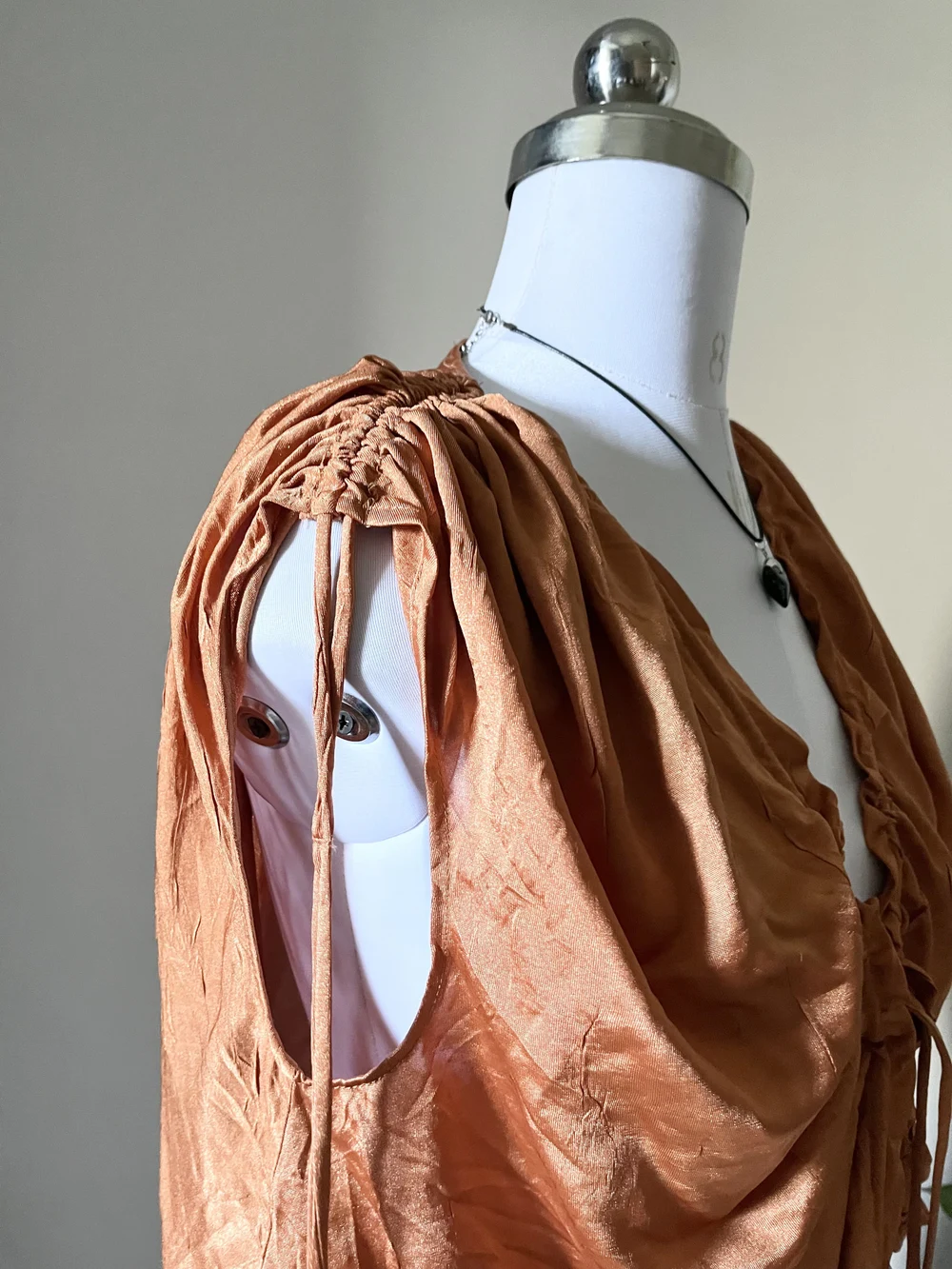 Orange Shrug style top 