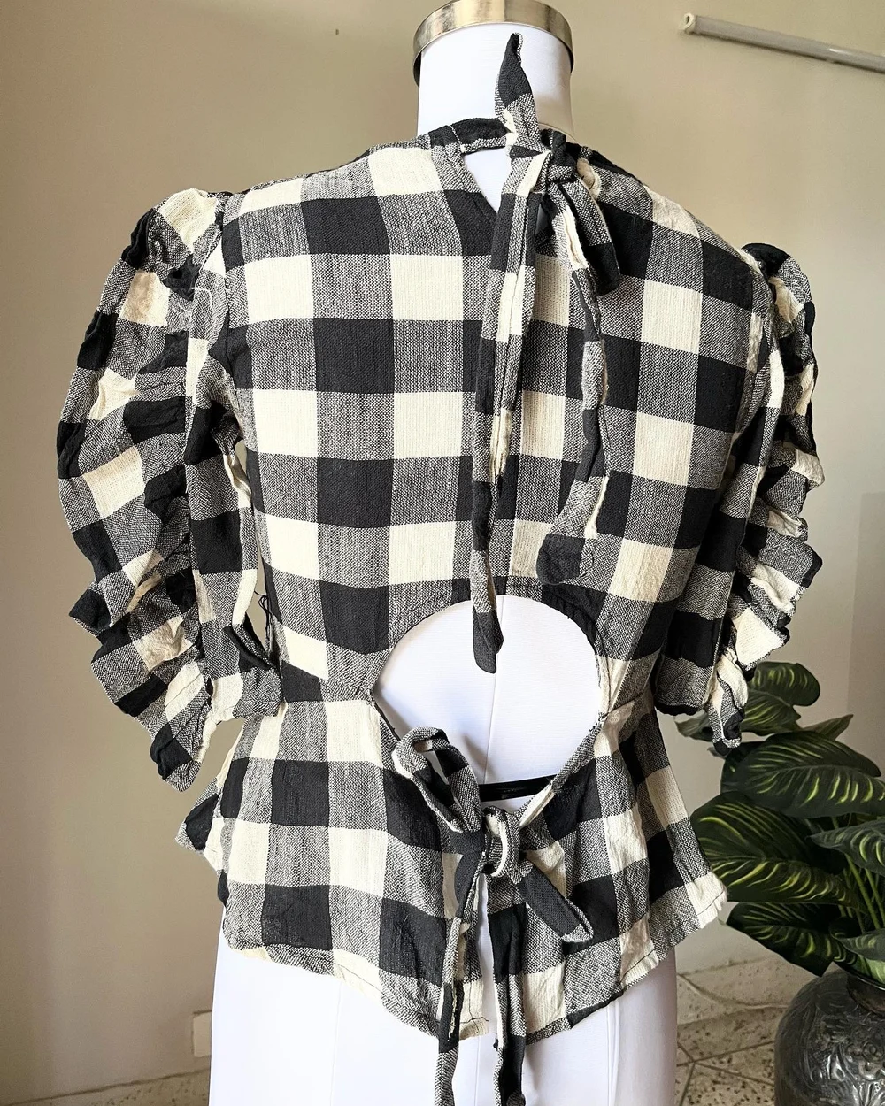 Checkered peplum top 
